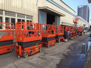 China Safety Load 320KG Hydraulic Scissor Lift With Working Height 13.8m Orange Color factory